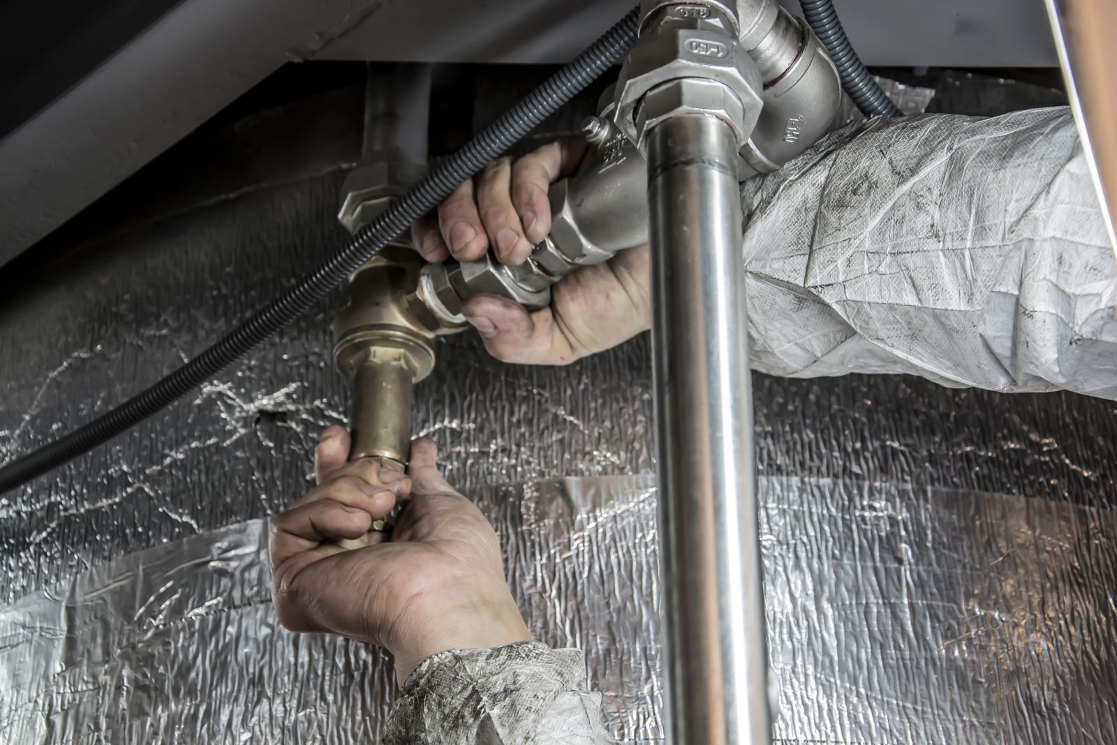 MasterP plumber fitting brass and chrome pipework — neat, quality plumbing